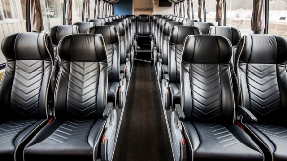 50 passenger charter bus inside brownsville